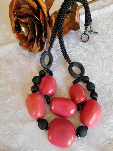 Black Kumihimo Necklace with Pink Tagua Nut Beads