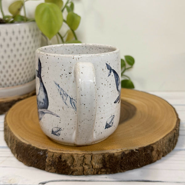 White speckled mug with whales 16oz.