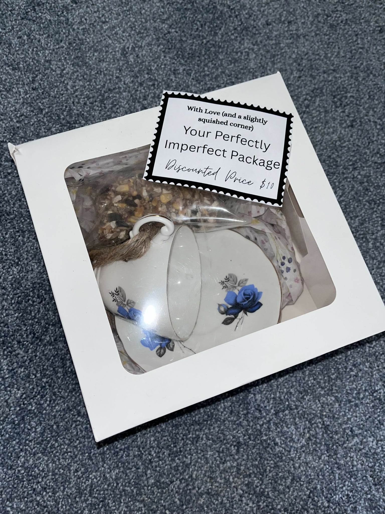 Discounted teacup bird feeder