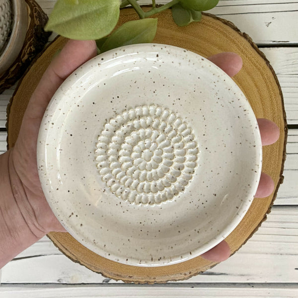 White speckled garlic grater