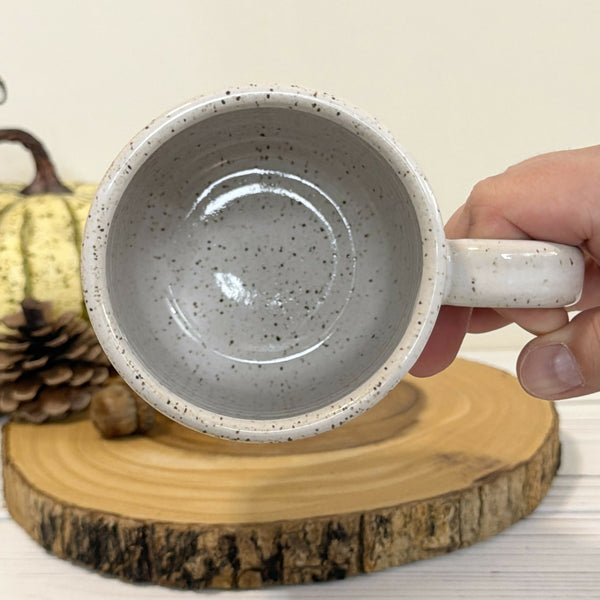 16 oz. “Pumpkin spice and everything nice” on white speckled mug