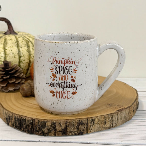 16 oz. “Pumpkin spice and everything nice” on white speckled mug