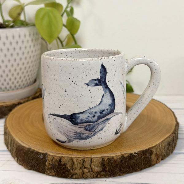 White speckled mug with whales 16oz.