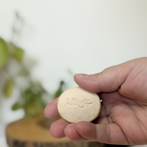 Pink bird patterned calming stone
