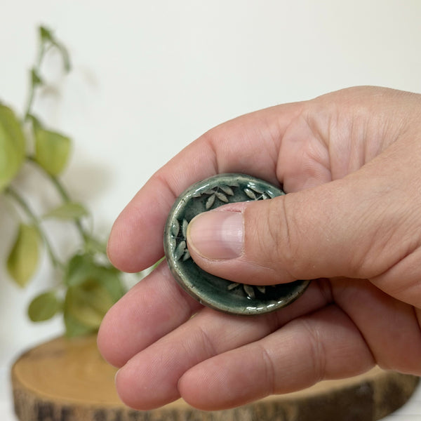 Green fern patterned calming stone