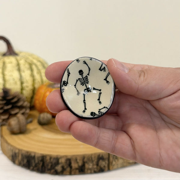 Skeleton Calming stone with dark purple rim