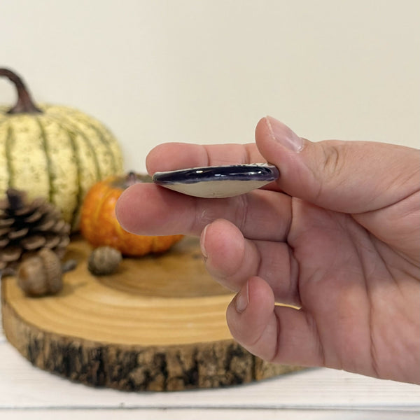Skeleton Calming stone with dark purple rim