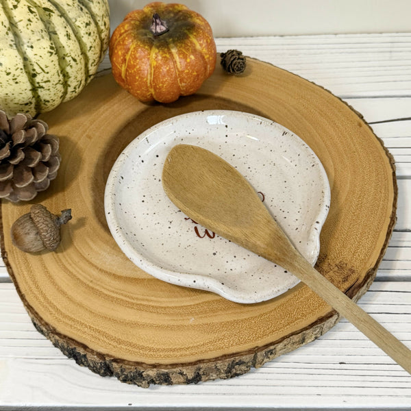 “Gobble till you wobble” on white speckled Spoon rest