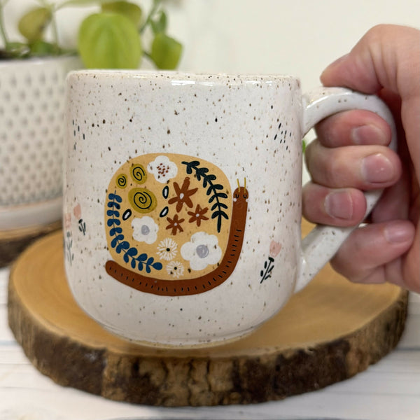 White speckled mug with snails 16 oz.