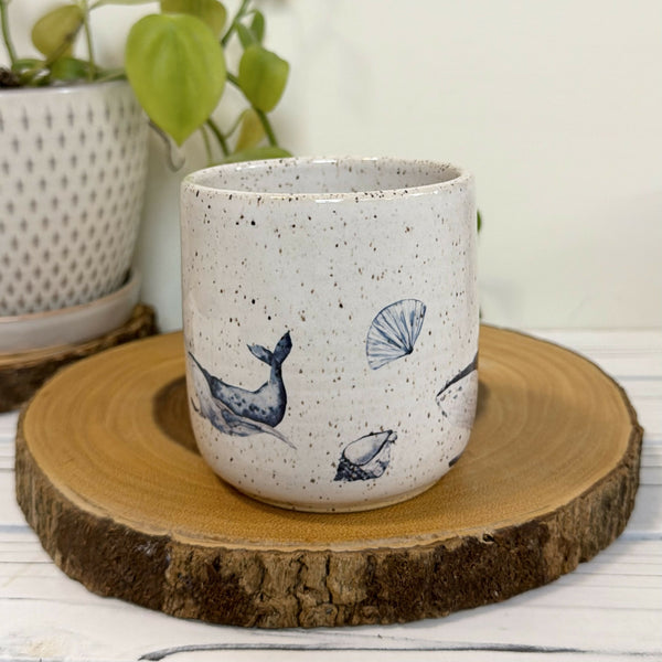 White speckled mug with whales 16oz.