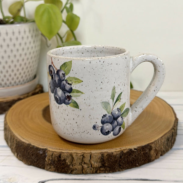 White speckled mug with blue berries 14 oz.