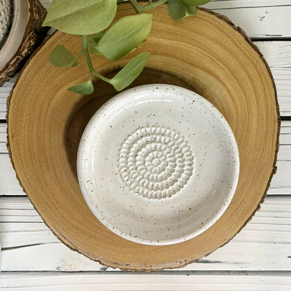 White speckled garlic grater