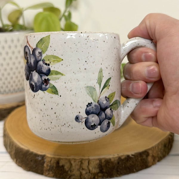 White speckled mug with blue berries 14 oz.