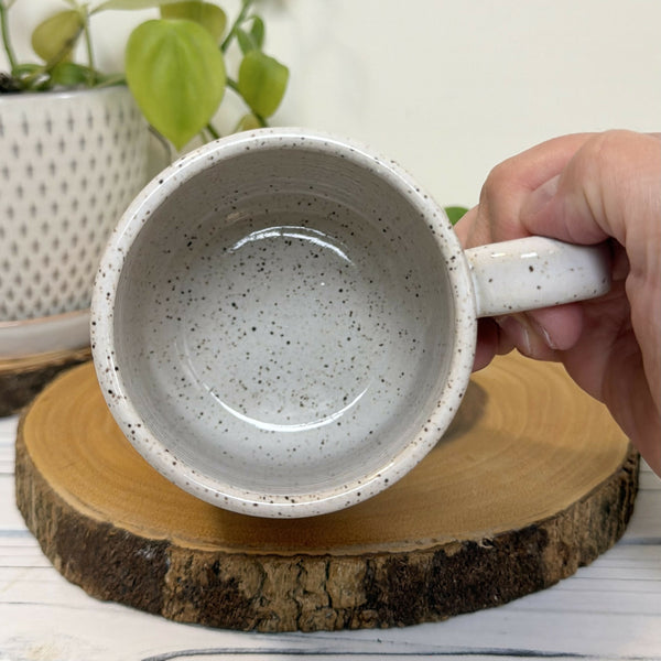 White speckled mug with snails 16 oz.