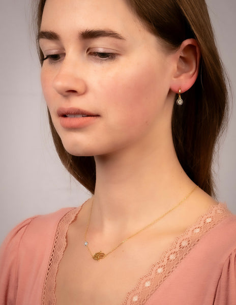 Watchful Sparkles Huggie Earrings