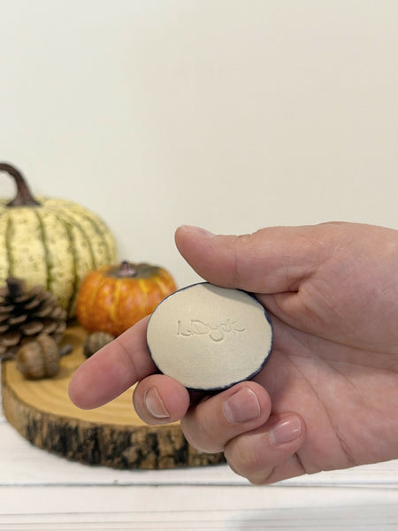 Skeleton Calming stone with dark purple rim