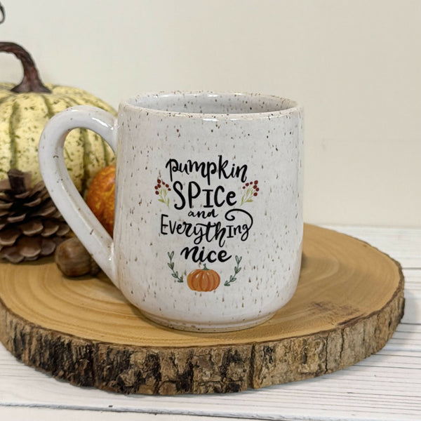16 oz. “Pumpkin spice and everything nice” on white speckled mug
