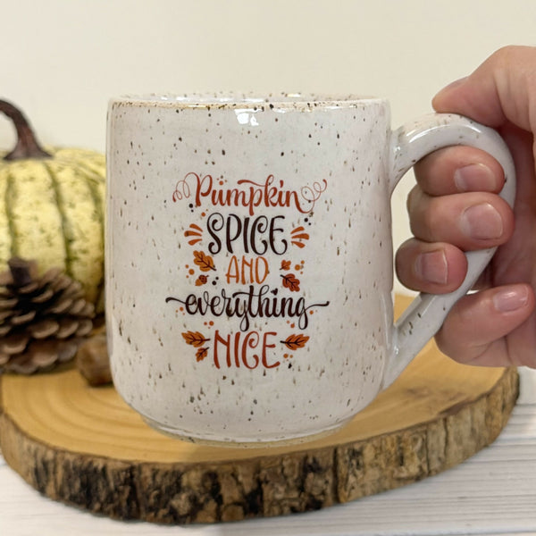 16 oz. “Pumpkin spice and everything nice” on white speckled mug