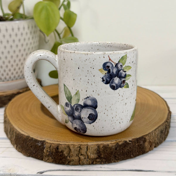 White speckled mug with blue berries 14 oz.